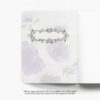 Pictured: The inside of the front cover. There is a lightly screened version of the front cover photo on it with a rectangular decorative element on top the photo.