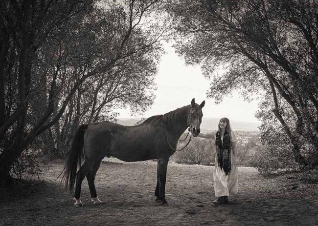 Portrait of woman and horse