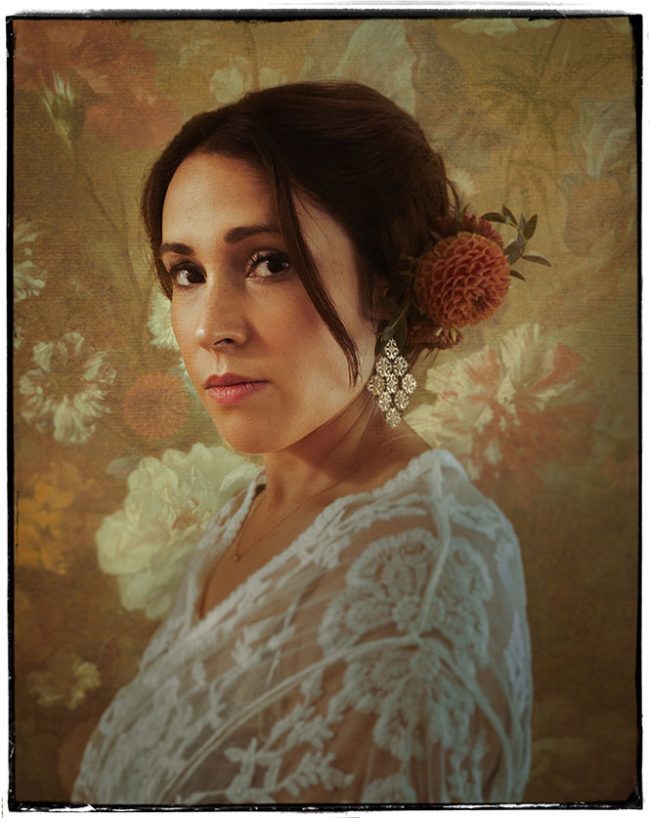 Portrait of woman with floral background